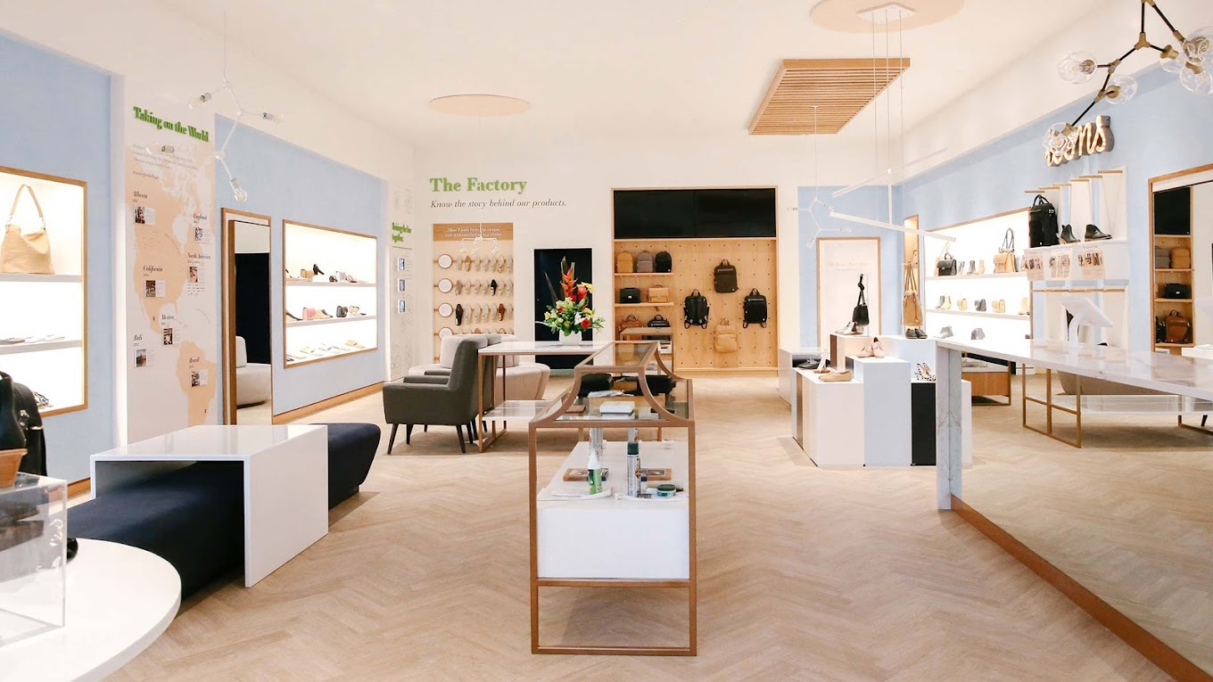 Poppy Barley's store features an open layout with light colors and simple, modern furniture.