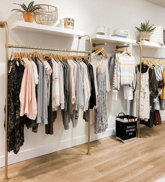 image of clothing products hanging on store rack