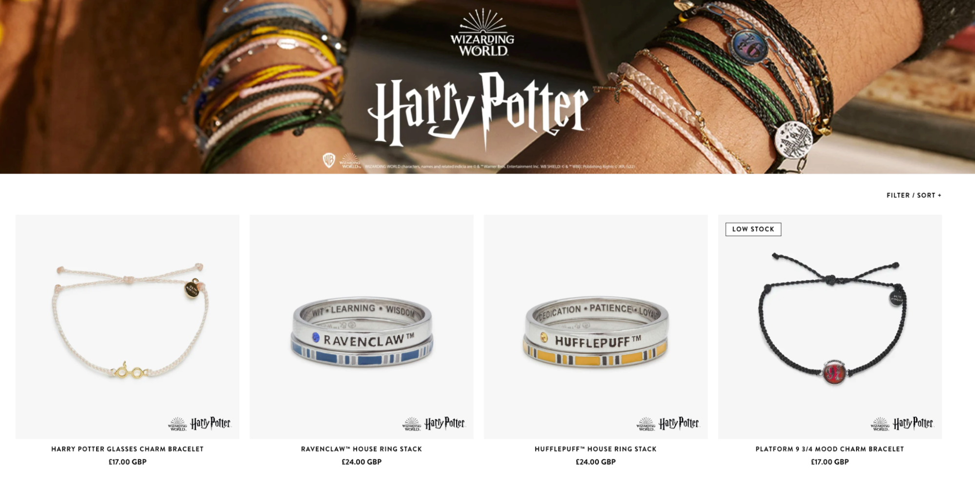 Harry Potter-themed bracelets and rings on a white background