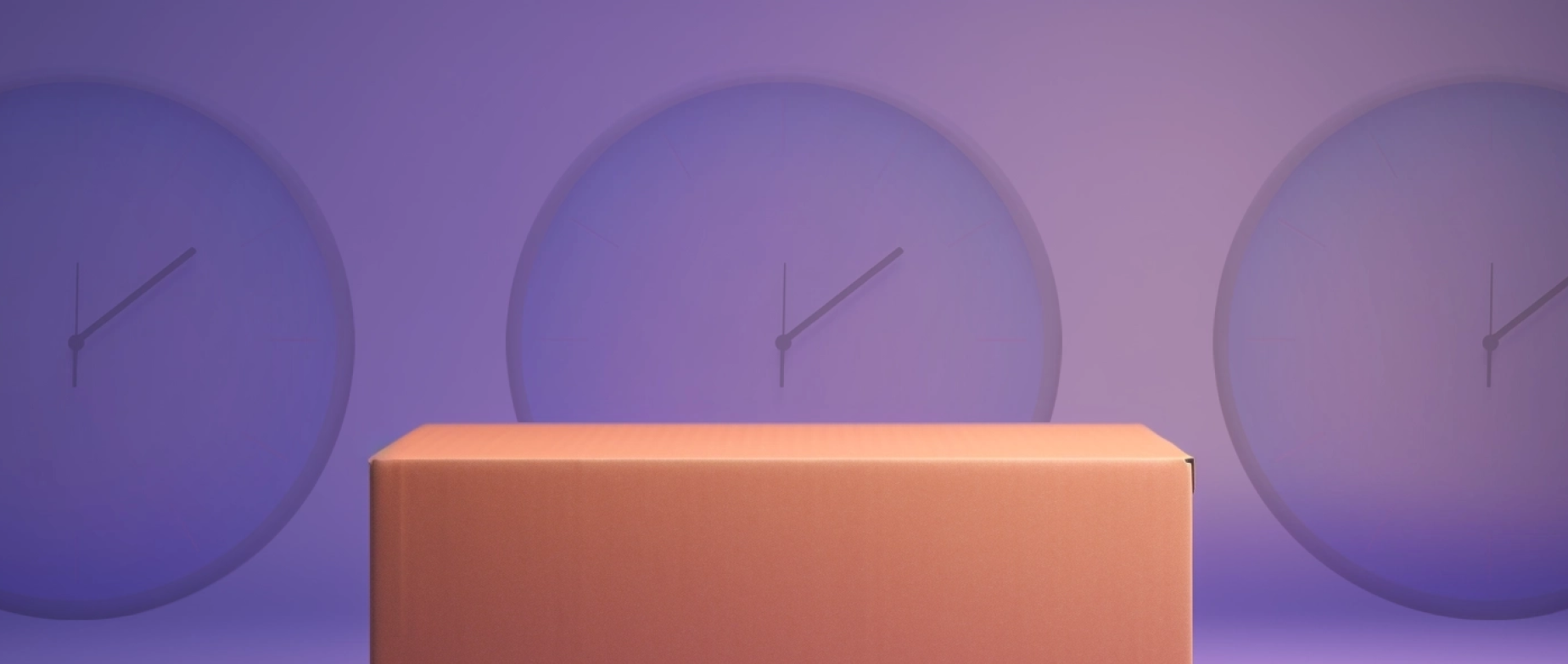 A cardboard box in front of a purple background with three clocks.
