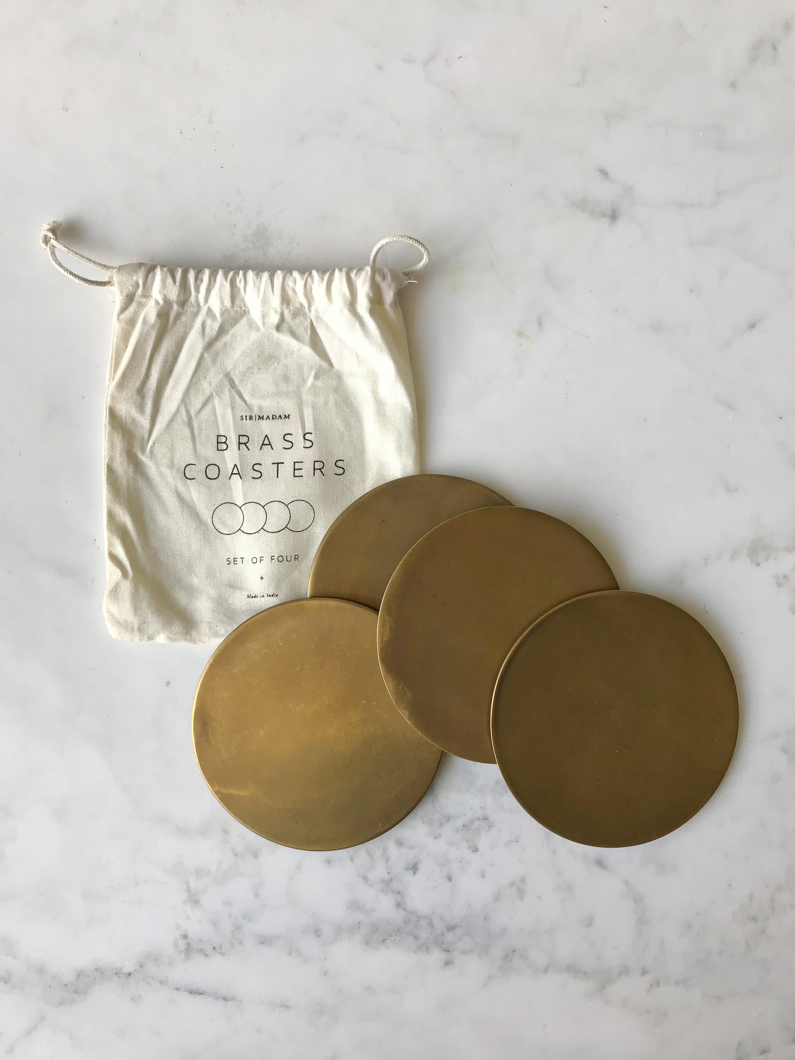 brass coaster set