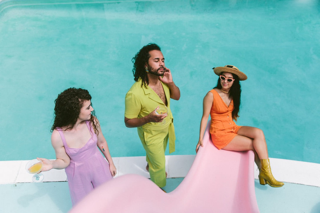 slim aarons-inspired poolside photoshoot with lgqbt models for pride 2020