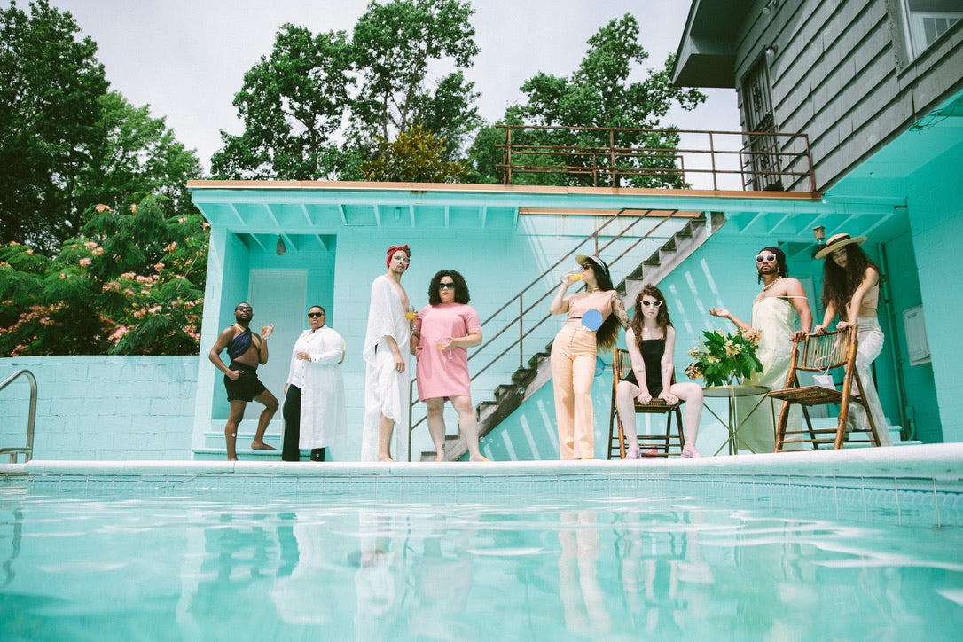 slim aarons-inspired poolside photoshoot with lgqbtq models for pride 2020