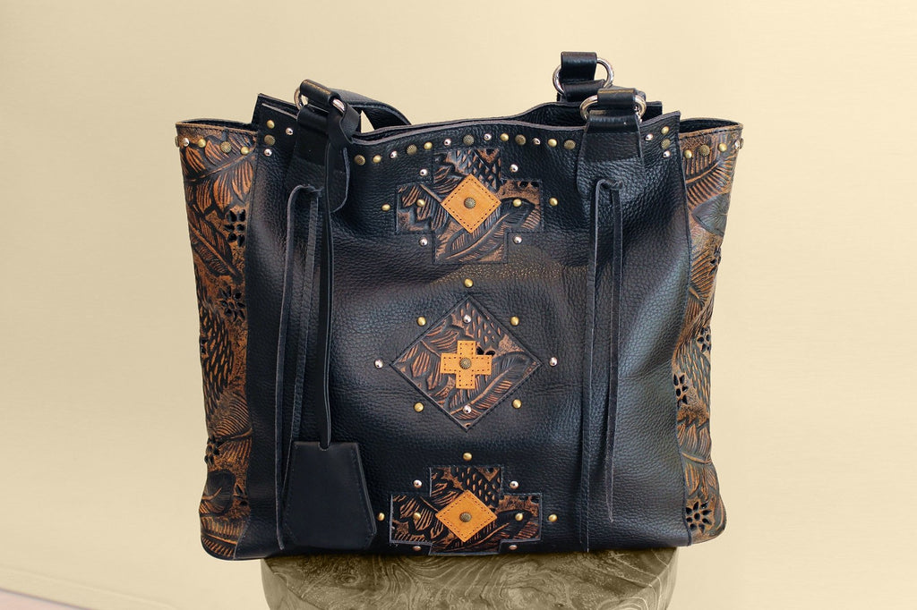 black tooled leather purse