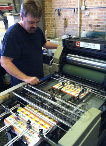 John Halle runs the in-house print shop which makes most of the packaging for DU-BRO