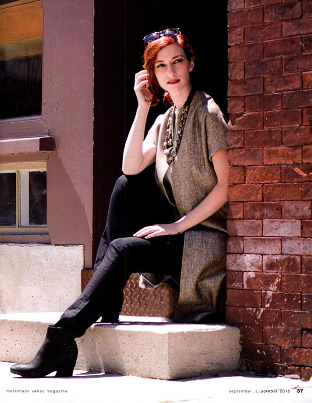 Model wearing Darby Scott Topper Coat & Jasper Necklace