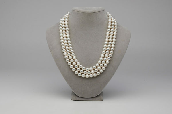 Three strands of perfect, natural white hanadama akoya pearls