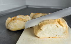 Serrated Knife Cutting Bread