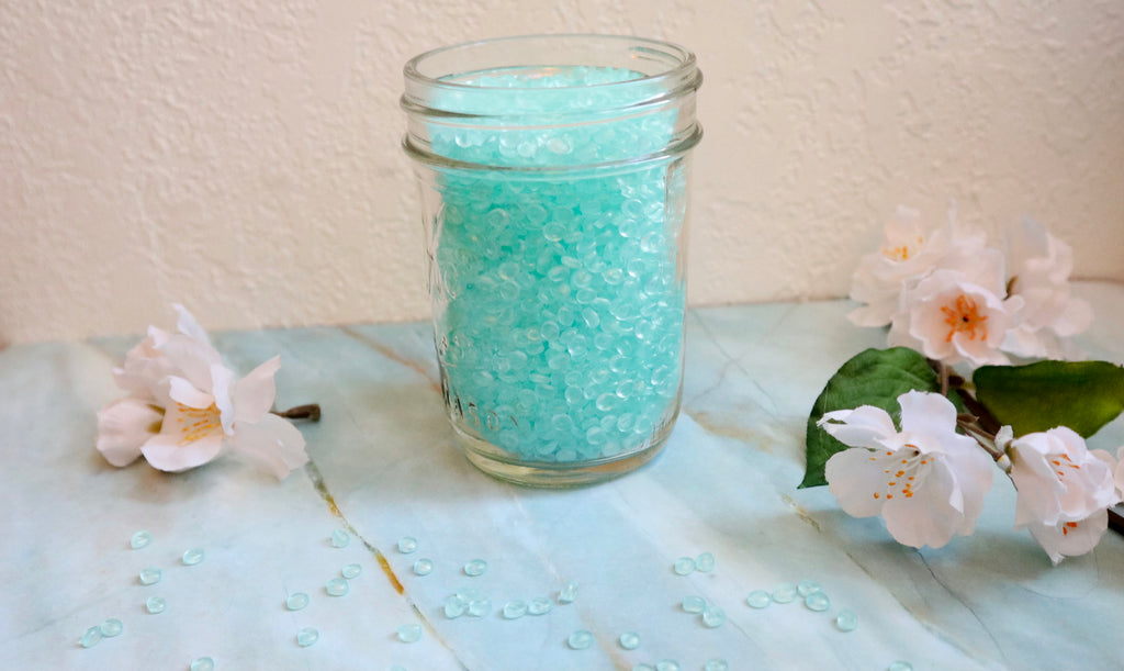 Blue Aroma Beads in a Glass Jar