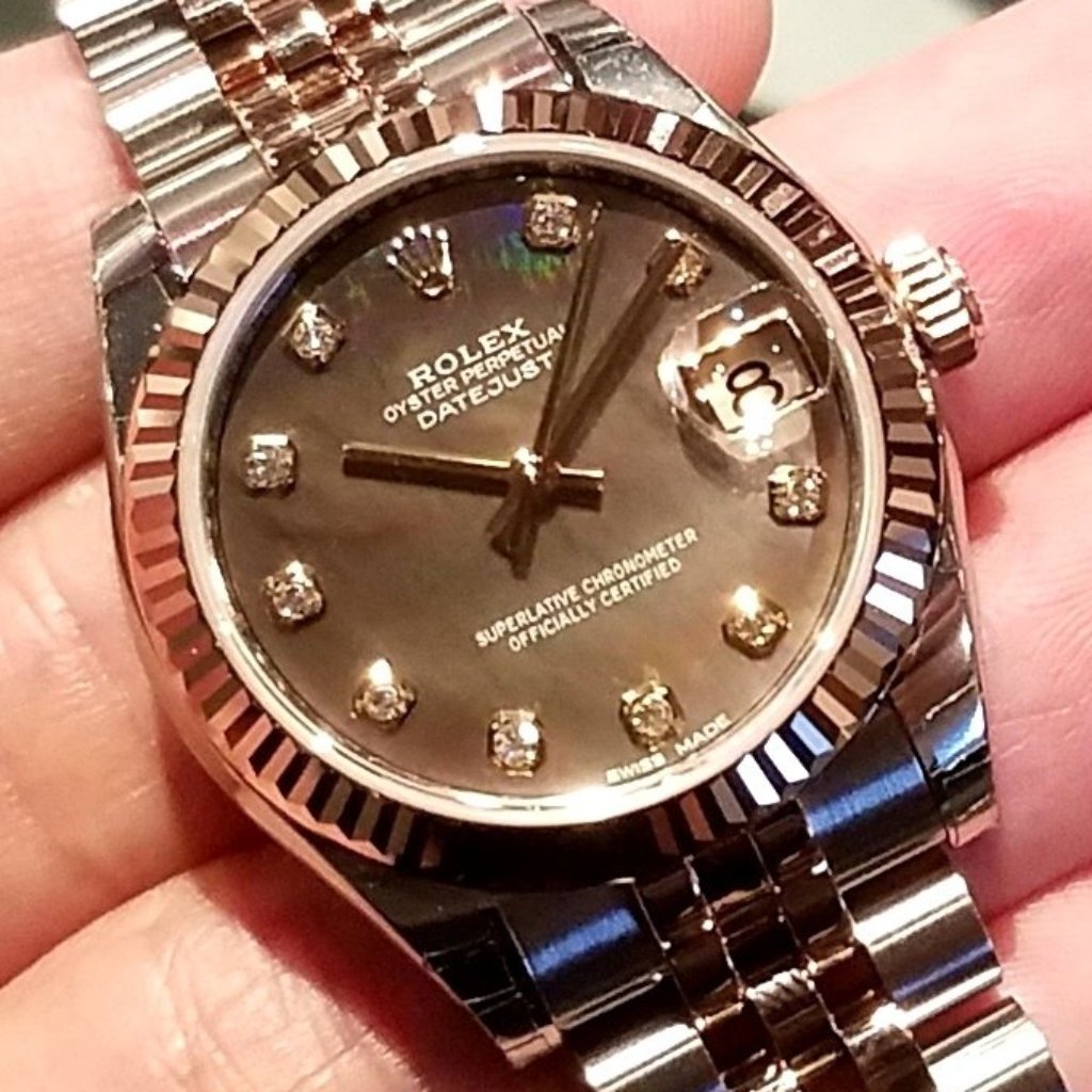 black mother of pearl rolex datejust