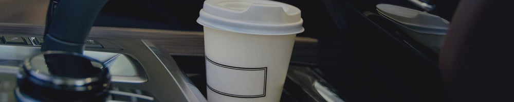 a coffee cup in a car