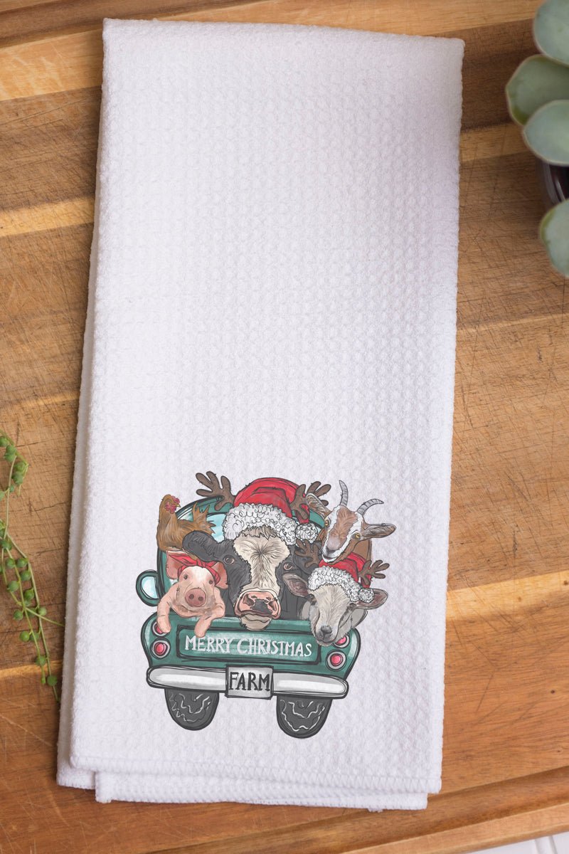 https://cdn.shopify.com/s/files/1/1250/2653/products/jit-waffletowel-farmanimalsmerrychristmasfarm-animals-merry-christmas-waffle-kitchen-towel-895332_1600x.jpg?v=1684867222