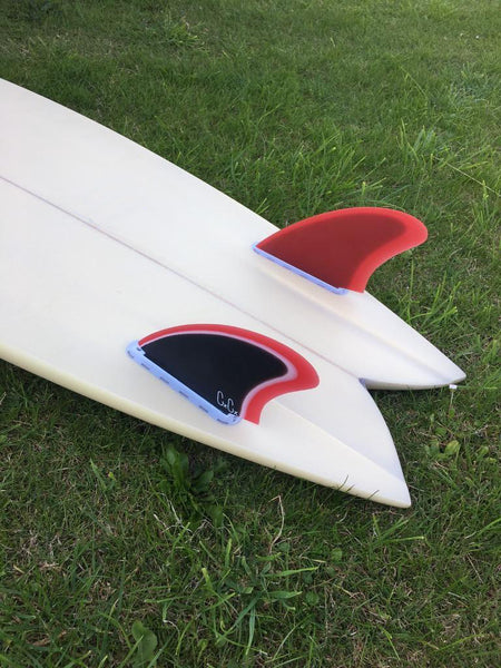 Twin Fin Surfboard on Grass 