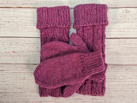 Photo of a set of matching knit purple leg warmers and mittens