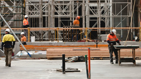 Team of builders working on an Australian construction site.