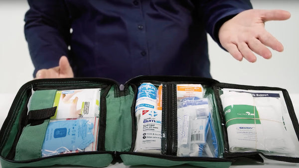 Brenniston National Standard Motor Vehicle First Aid Kit contains various dressings