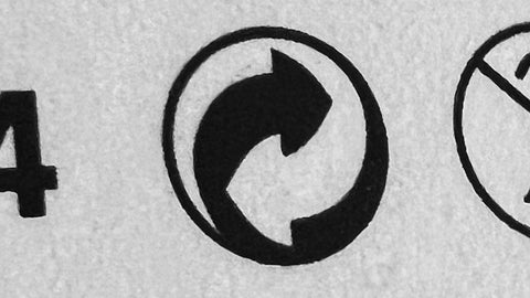  Photo of workplace first aid item showing packaging symbol of a circle with two arrows to indicate the producer of the first aid item has made a financial contribution towards the recovery and recycling of packaging.