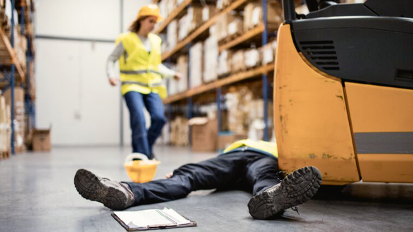 Australian warehouse worker rushes to help a warehouse worker who may have been fatally injured in a workplace accident.