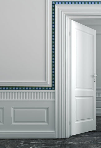 Picture of a door frame with a blue wallpaper boarder