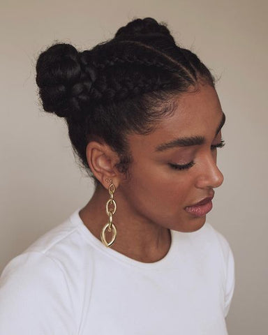 Influencer Curlbellaa Wearing Braided Double Buns