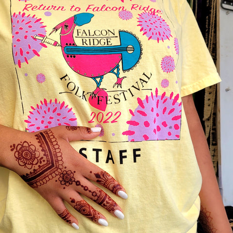 Teen volunteer with henna tattoo