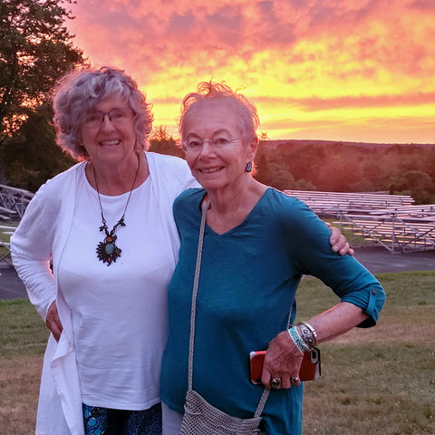 Amazon Ecology volunteers Jane and Carol at Falcon Ridge Folk Festival