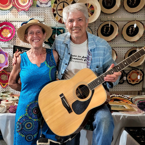 Campbell Plowden and Diane at the Amazon Ecology booth at the Philadelphia Folk Festival