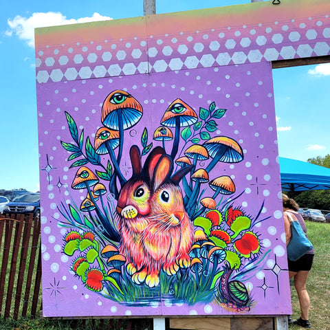 Purple rabbit sign near craft vendor area at the Philadelphia Folk Festival 2022