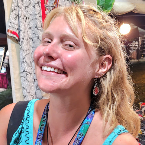 Woman with Amazon earrings at Philadelphia Folk Festival 2022