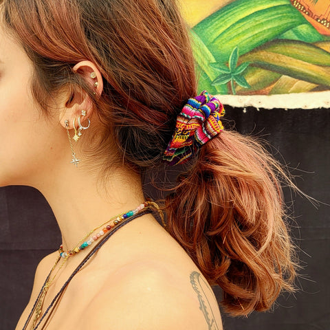 Woman with colorful Amazon scrunchie at Rhythm and Roots Festival 2022