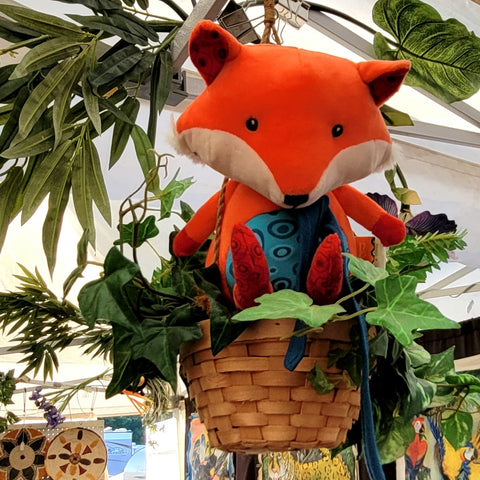 Fox in plant box in the Amazon Ecology booth at the Grey Fox Bluegrass Festival