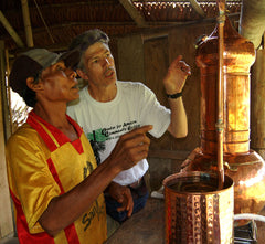 Campbell and Manuel distilling copal resin at Brillo Nuevo. Photo by Amazon Ecology.