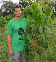 Robin Van Loon with young tree. Photo by Campbell Plowden/Amazon Ecology