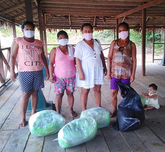 Bora families receiving COVID relief packages from Amazon Ecology. Photo by Amazon Ecology