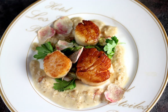 Pan-seared sea scallops with a Champagne Truffle Cream