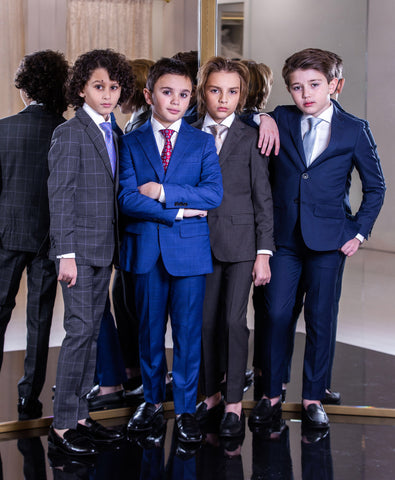 4 boys in suits