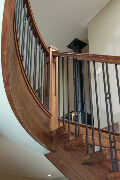 Craftsman style stair railing with a unique baluster pattern