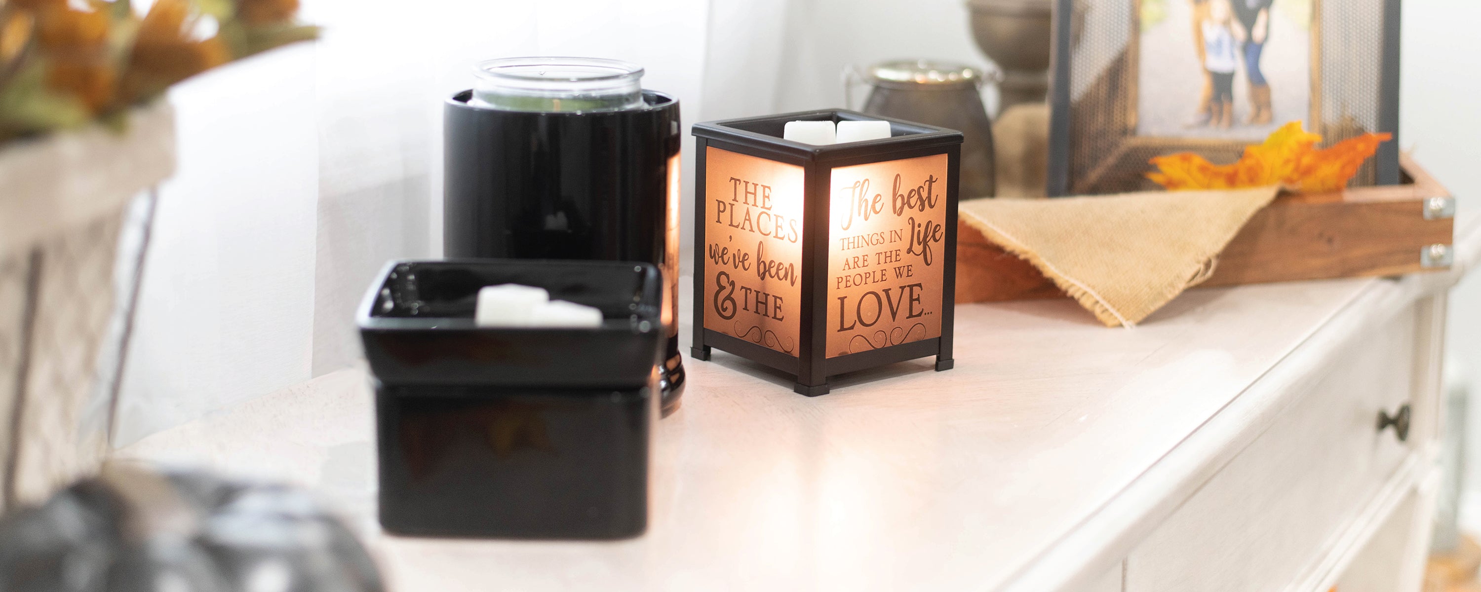 Elanze warmer group shot; 2-in-1 warmer, jar warmer, and glass lantern warmer