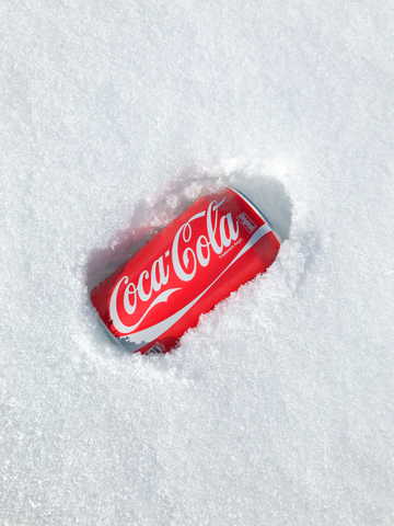 Can of Coke Cola in the snow