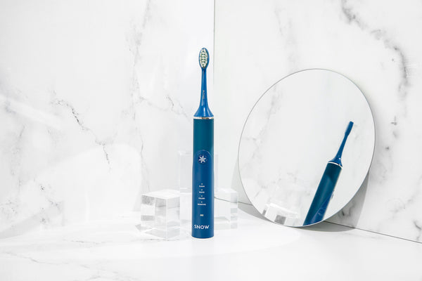 do electric toothbrushes make teeth whiter