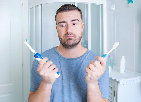 which is better manual toothbrush or electric