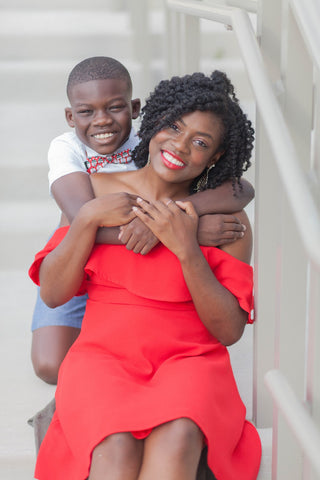 black mom and her son smiling