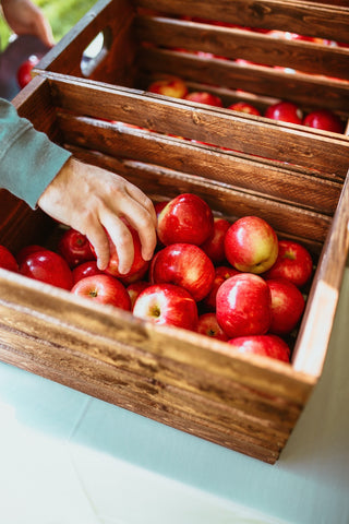 wooden boxes full of fresh apples