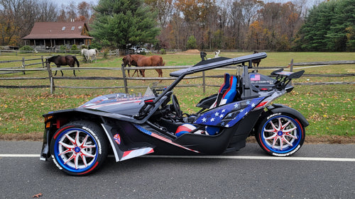 Polaris Slingshot with Red, White, and Blue wheels America