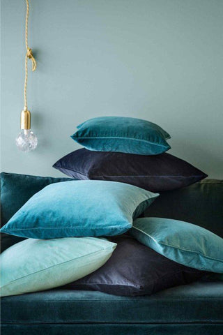 Navy and teal velvet pillows from H&M