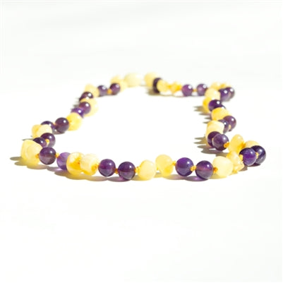 the amber monkey teething necklace