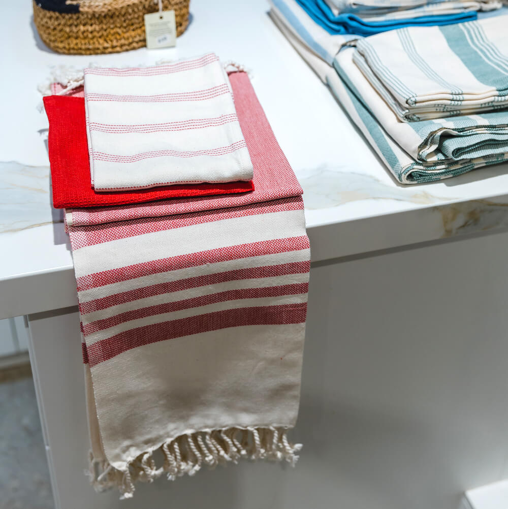 https://cdn.shopify.com/s/files/1/1256/7661/products/optimized-red-towel_1600x.jpg?v=1668093443