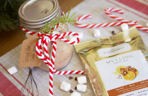 Jar of hot cocoa mix gift with mini marshmallows and Raven's Nest mulling spices