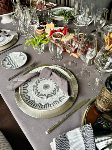 Rectangle gray linen tablecloth elegantly draped over a wedding reception table, adding sophistication and style to the decor.