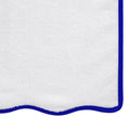 Luxurious white towel with bold royal blue border, soft and durable